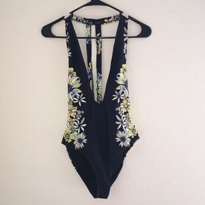 Unused one piece low cut floral bathing suit
